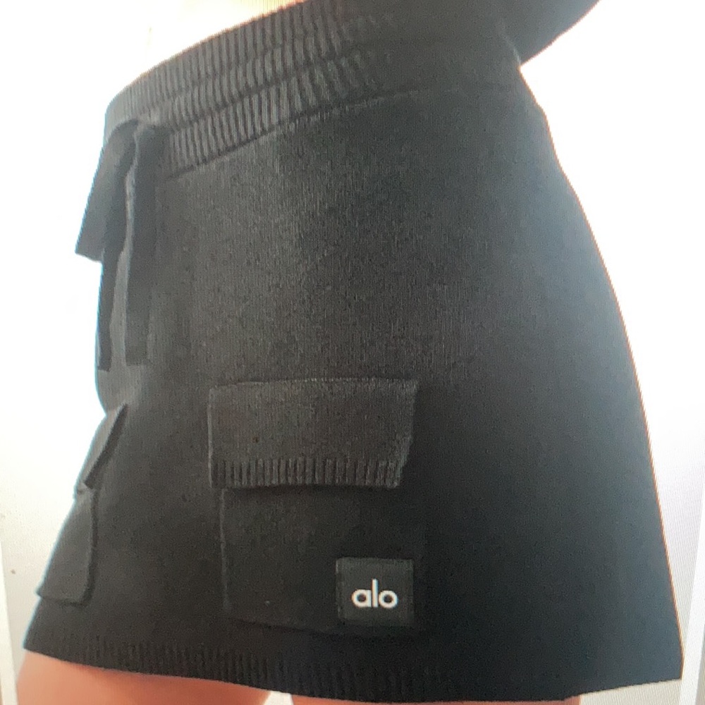 Also yoga Black Knit mini skirt with front pockets size Small